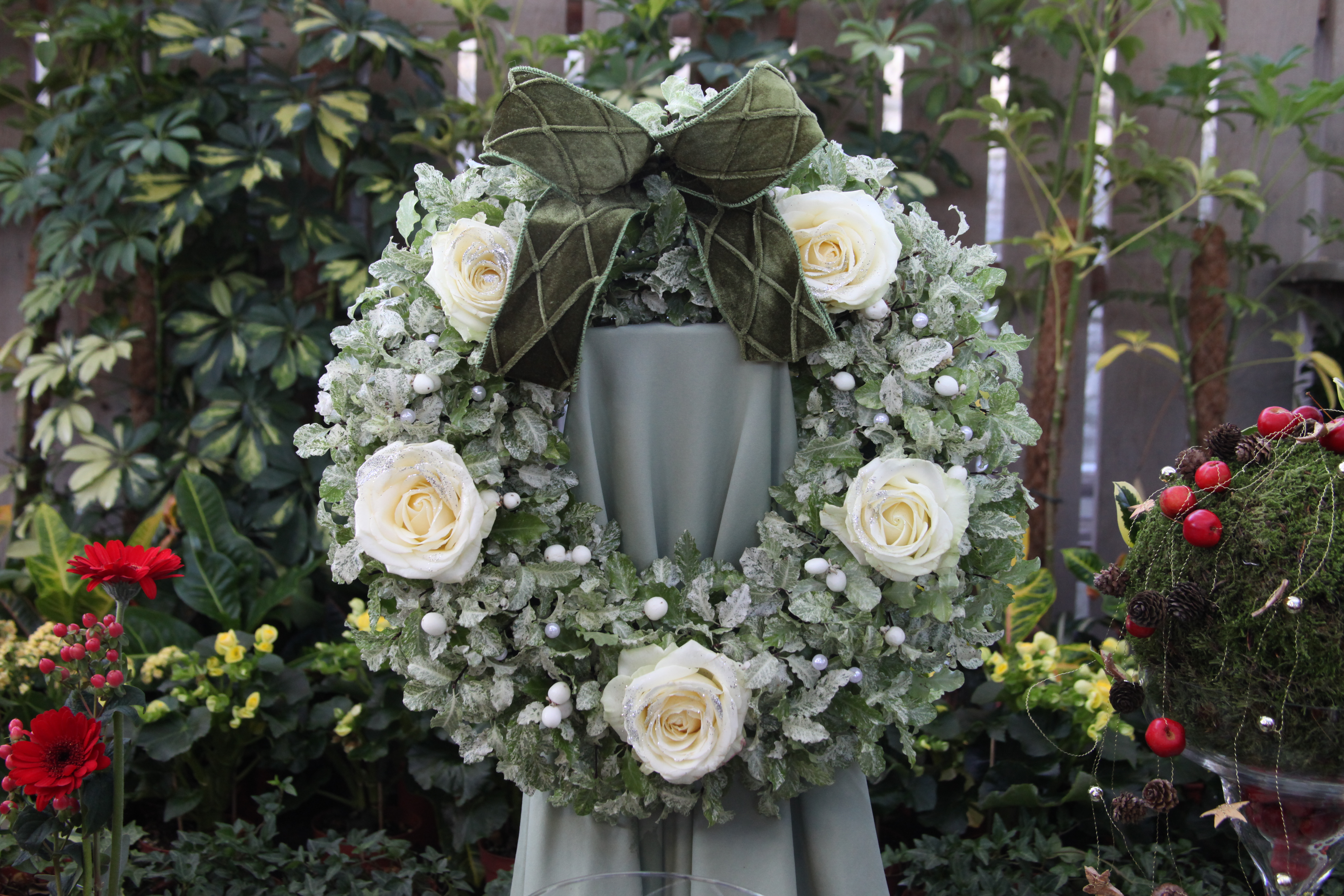A white winter floral wreath with classic white roses - gorgeous!