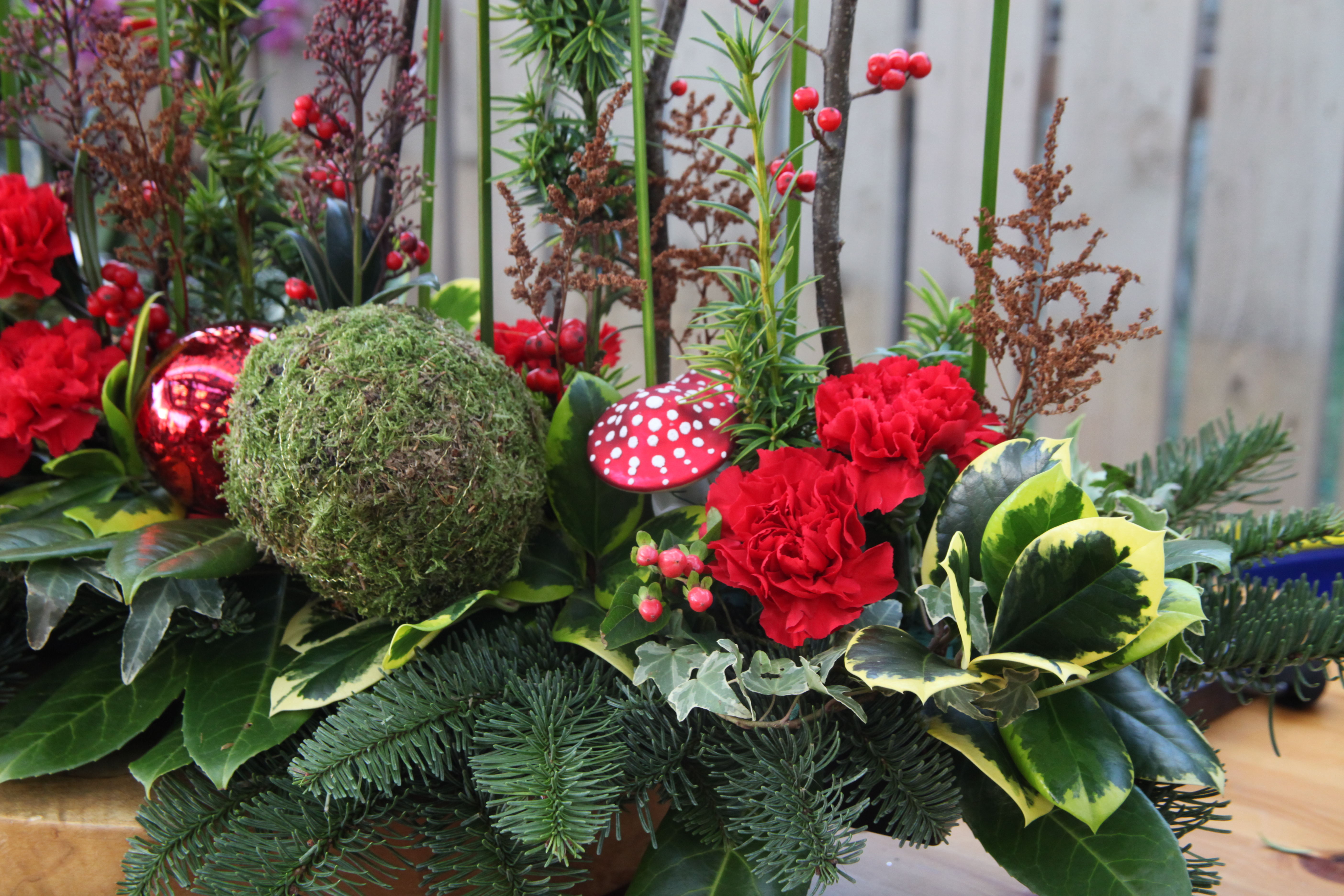 An Enchanted Floral Arrangement with toadstools by Floral Artist Carol Bone